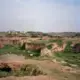 A view of the isolated I-12 Afghan refugee settlement, located on the outskirts of Islamabad, Pakistan. Image by Sara Hylton. Pakistan, 2018.