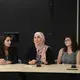 Shirin Alhroob from Forsyth Technical Community College answers a question while Mariana Rivas from Texas Christian University, Taylor Damann from Southern Illinois University Carbondale, and Cammie Behnke from Elon University listen. Image by Nora Moraga-Lewy. United States, 2019.