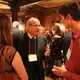 William Freivogel, journalism professor at Southern Illinois University Carbondale, talks with student fellows Ingrid Holmquist and Tomas Posada. Image by Karena Phan. United States, 2018.