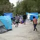 The camp near the Gateway International Bridge, which connects Matamoros and Brownsville, began forming last year. Media reports say Mexican officials plan to move the migrants to a stadium farther from the river. Image by Miguel Gutierrez Jr. Mexico, 2019.