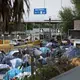 The camp near the Gateway International Bridge, which connects Matamoros and Brownsville, began forming last year. Media reports say Mexican officials plan to move the migrants to a stadium farther from the river. Image by Miguel Gutierrez Jr. Mexico, 2019.