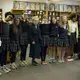 Students involved in a video reflecting on the Middle East Strategy Task Force executive summary, pose with Madeleine Albright and Stephen Hadley, at Nerinx Hall High School in St. Louis, Missouri. Image by Lauren Shepherd, United States, 2017.