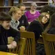 Hannah Knapik, a student, asks Madeleine Albright, “How do you think that having an all girls education has impacted your career and your character” at Nerinx Hall High School in St. Louis, Missouri. Image by Lauren Shepherd, United States, 2017.