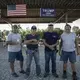 Trump supporters Jim Rainbolt, 57, left, Rick Warren, 65, Bill Stevens, 76, and Roger Plott, 65, stand outside their clubhouse in West Vienna, Ill. Image by Wong Maye-E/AP Photo. United States, 2020.