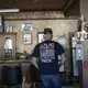 Bill Stevens, 76, stands inside the clubhouse in West Vienna, Ill. Image by Wong Maye-E/AP Photo. United States, 2020.