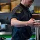 Tony Mao makes noodles at Everyday Noodles in Squirrel Hill. Image by Stephanie Chambers. United States, 2018. 