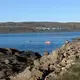 Fishing at the Iqaluit causeway is affordable but is only possible during six weeks of the summer. Image by Julie De Meulemeester. Canada, 2018.<br />
