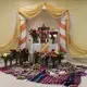 The altar of Santa Vera Cruz in Arlington, Virginia, 2016. Santa Vera Cruz is the beginning of the agricultural new year on May 3rd, after Carnival, and the period of fertility. During Santa Vera Cruz, people give thanks for what they received in the previous year, and ask for another good year, leaving objects representing their desires at the altar. Later, people sing to Santa Vera Cruz with their comparsas. Image by Carey Averbook. United States, 2017.