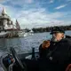 Kenneth 'Captain Ken' Kloster Sr. pilots his boat to his home on Dollar Island in Les Cheneaux Islands on Lake Huron in the Upper Peninsula of Michigan on Nov. 23, 2019. He bought the island in 1981 right before record setting high water levels of 1986. Image by Zbigniew Bzdak / Chicago Tribune. United States, 2020.