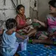 Rhoda and her children. Image by James Whitlow Delano. Philippines, 2018. 