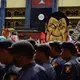 Law enforcement officers in front of an effigy of President Rodrigo Duterte during a rally against the extrajudicial killings and other issues in Quezon City, July 24, 2017. Image by Pat Nabong. Philippines, 2017.