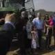 U.S. Ambassador to China Terry Branstad and his family pose for a photo on the China-U.S. Demonstration Farm during its groundbreaking ceremony on Saturday, Sept. 23, 2017, in Luanping County, Hebei, China. Image by Kelsey Kremer. China, 2017.