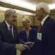 Terry Branstad, U.S. ambassador to China, and his wife, Chris Branstad say hello to Rick Kimberley, a corn and soy bean farmer from Iowa, during an Iowa Sister States reception on Wednesday, Sept. 20, 2017, in Beijing, China. A groundbreaking will be held this weekend for a replica of Kimberley's family farm being built in China. Image by Kelsey Kremer. China, 2017.