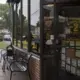 Two customers walk down the sidewalk after eating at the Hamburg Inn No. 2 on Friday, Oct. 6, 2017, in Iowa City. Image by Kelsey Kremer. United States, 2017.