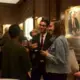 Rafael Alves de Lima (Wake Forest University) and Liz Weber (American University) mingle during the Cosmos Club reception. Image by Nora Moraga-Lewy. United States, 2019.<br /> 