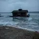 A floating boathouse during a storm in Snows Channel at Les Cheneaux Islands in the Upper Peninsula of Michigan on Nov. 21, 2019. Image by Zbigniew Bzdak / Chicago Tribune. United States, 2020.