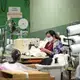 ASHEBORO, NORTH CAROLINA - Maria Reyes Alonso, sewer, at the Bossong Medical plant in Asheboro, N.C. sews elastic bands onto masks on Thursday, July 16, 2020. Image by Jeff Siner/The Charlotte Observer/North Carolina News Collaborative. United States, 2020.