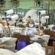 ASHEBORO, NORTH CAROLINA - Sewers work on various textile products at the Bossong Medical plant in Asheboro, N.C. on Thursday, July 16, 2020. Nufabrix contracted the Bossong Medical plant to make Theramasks. Image by Jeff Siner/The Charlotte Observer/North Carolina News Collaborative. United States, 2020.