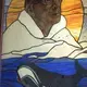 Stained glass window in Utqiagvik, Alaska. Image by Amy Martin. Alaska, 2018.