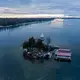 Dollar Island at Les Cheneaux Islands on Lake Huron in the Upper Peninsula of Michigan on Nov. 20, 2019. Kenneth Kloster Sr., also known as ' Captain Ken,' bought the island in 1981 right before the record-setting high water levels of 1986. Image by Zbigniew Bzdak / Chicago Tribune. United States, 2020.