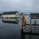 Mark Engle, owner of the Les Cheneaux Landing resort in Snows Channel at Les Cheneaux Islands, recently elevated and rebuilt his boat docks because of rising waters. Image by Zbigniew Bzdak / Chicago Tribune. United States, 2020.