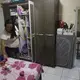 Fabiane Lopes gets medicine for her daughter, Valentina, at their home (left) in Duque de Caxias, a suburb of Rio de Janeiro in southeastern Brazil, while Eduarda Lopes, 9, holds her sister (right). Image by Mark Hoffman. Brazil, 2017.