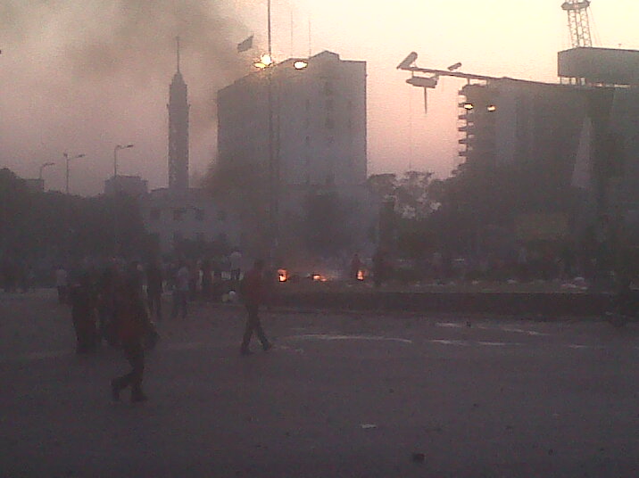 Fires erupt in Tahrir Square's tent city after youth protesters clash with baltagiya. Image by Thomas Francis. Cairo, July 2011. image