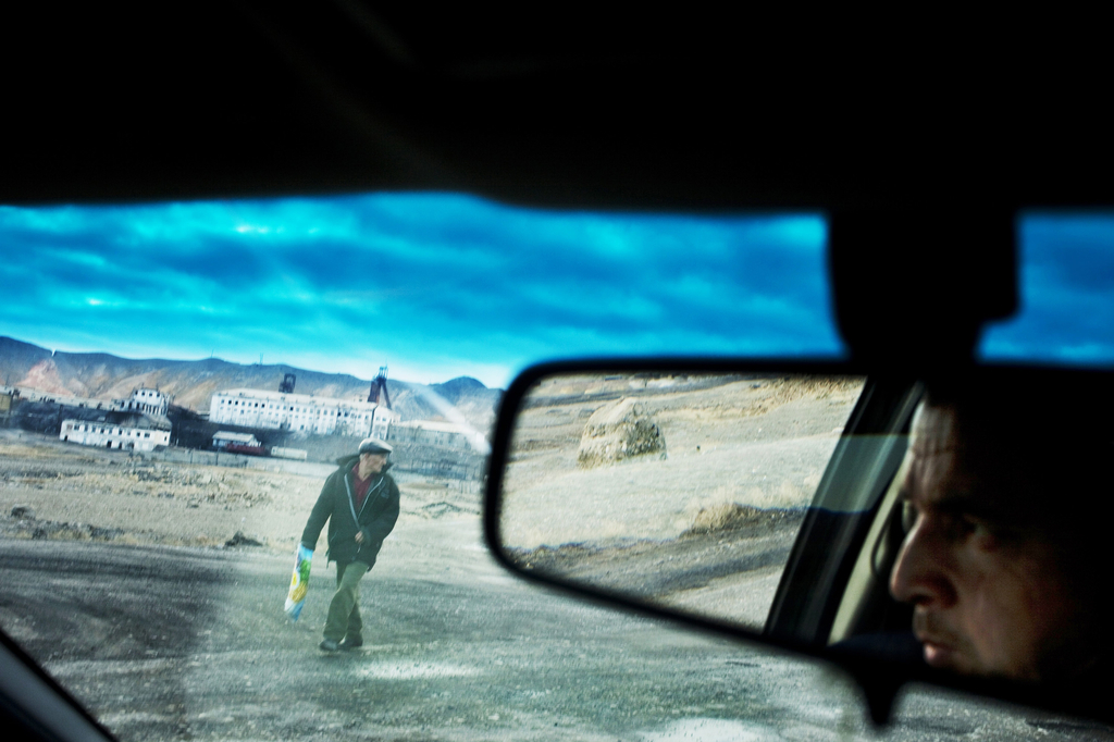 A street scene in Shurab, a coal mining town in northern Tajikistan whose population has been depleted in recent years due to lack of work. Image by Carolyn Drake. Tajikistan, 2009. 1