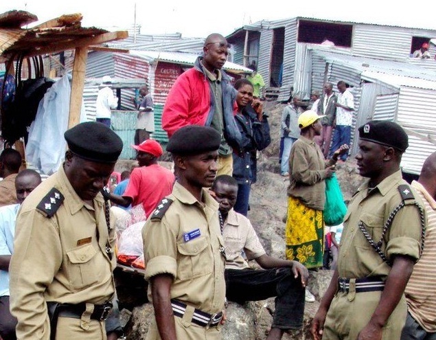 Ugandan marine police guard the tiny fishing-rich island of Migingo in Lake Victoria. Kenya, like Uganda, claims ownership. (photo by Ouko Okusah) 1