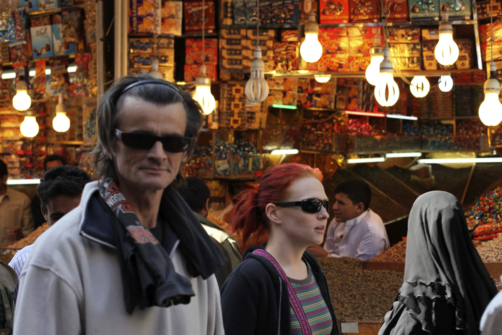 Tourists visit Old Sana'a city, Jan. 7, 2010. Image by Ahmed Jadallah/Reuters. Yemen, 2010. Media file: yemen tourists.jpg